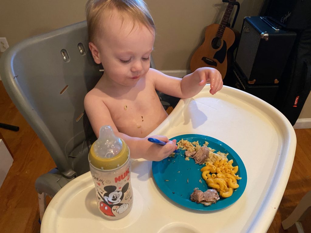 The baby eating some of the 4Patriots food