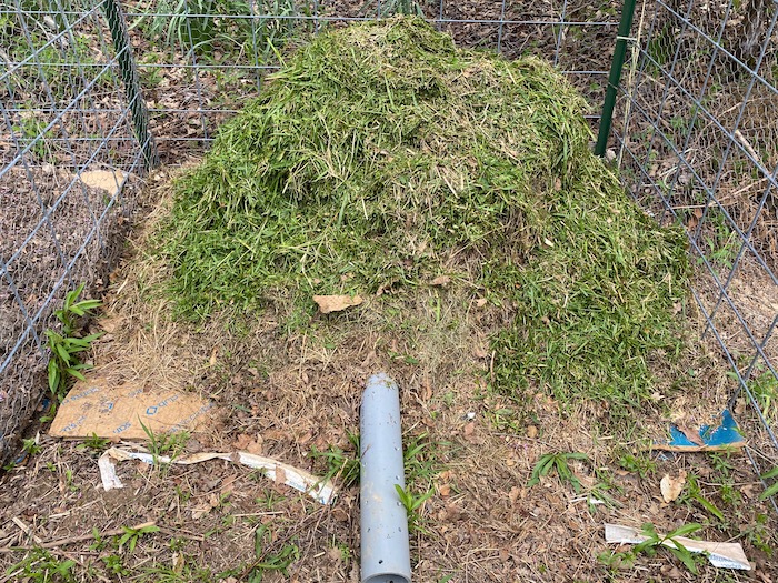 Compost pile with pipe