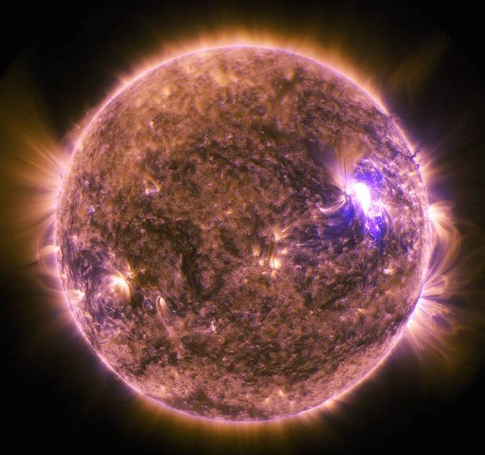 A solar flare bursting from the sun