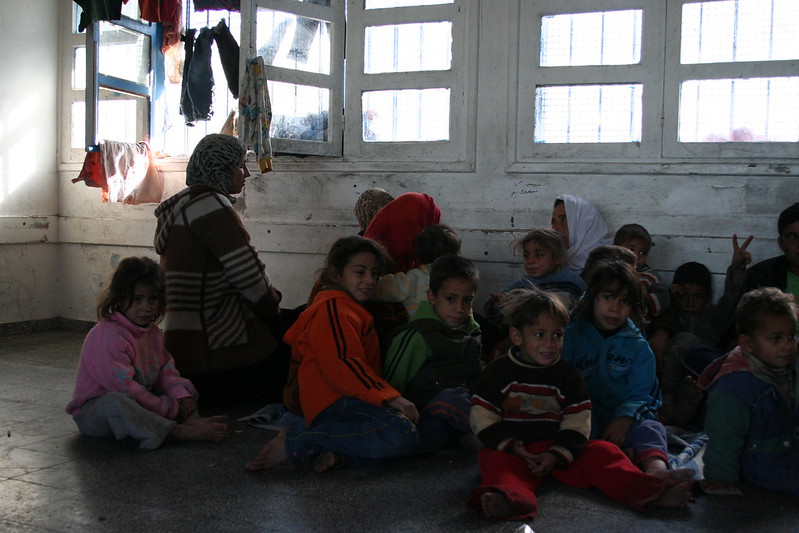Palestinian children taking refuge