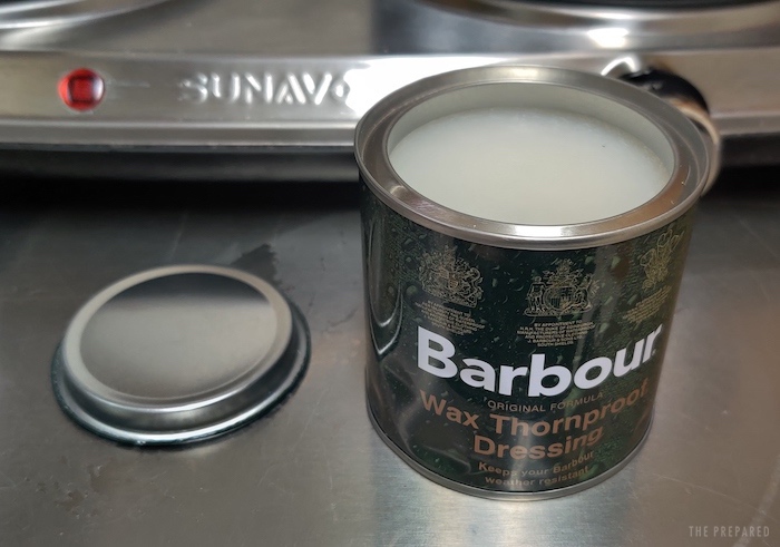 An open can of Barbour wax