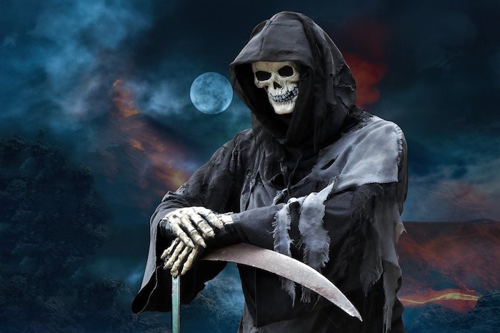 Grim Reaper with his scythe