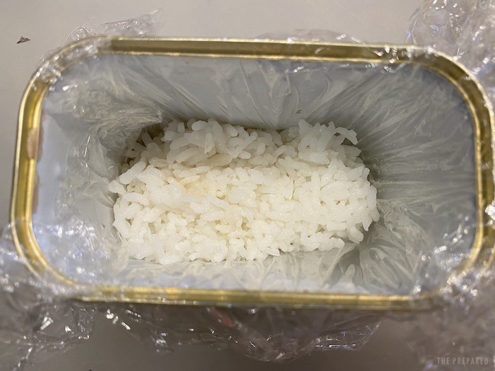 Rice pressed into the Spam can
