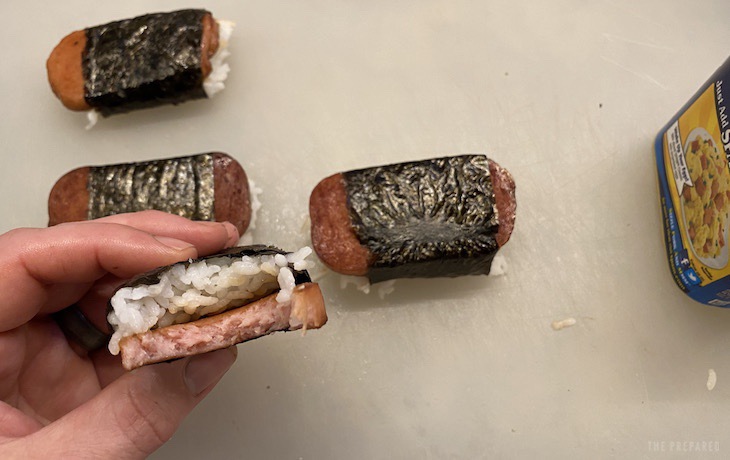 Bitten Spam musubi in front of other musubis